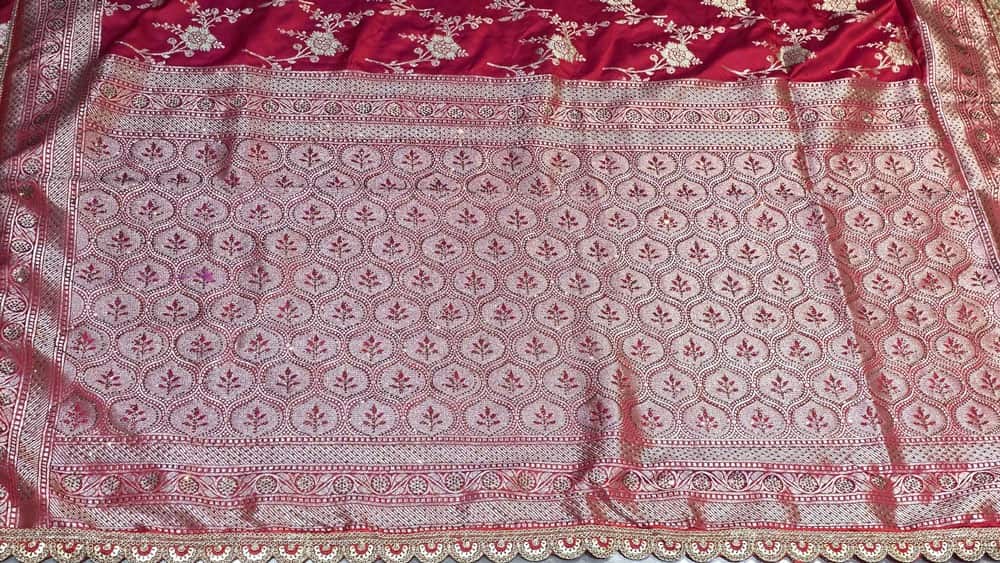 Traditional red Banarasi saree with silver zari for wedding and festivals