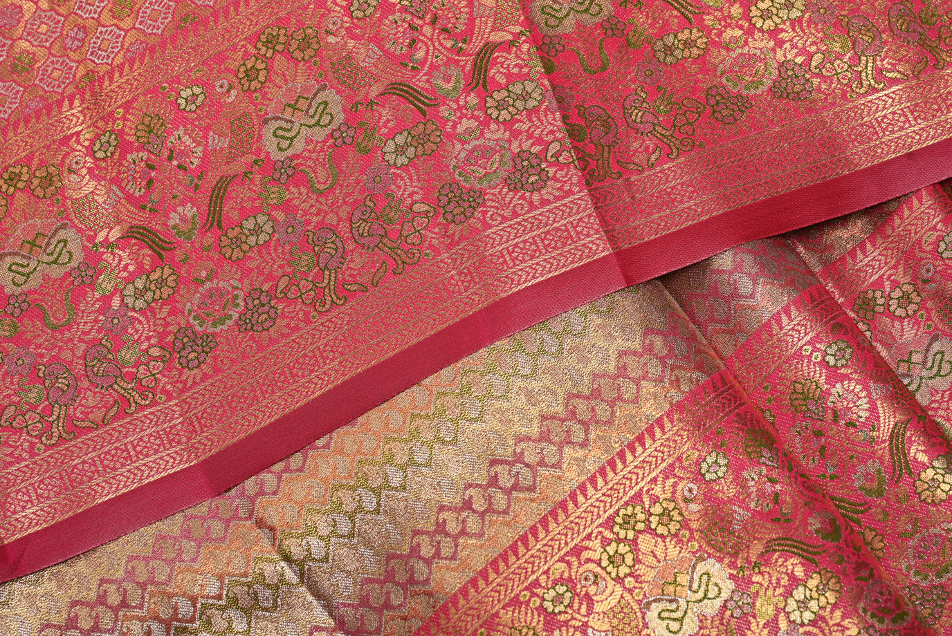 Golden Kanjivaram Silk Saree with Fancy Design and Pink Contrast Aari Work Blouse