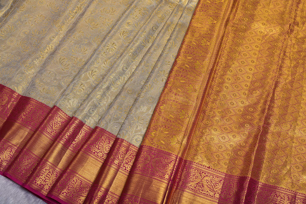 Cream Pure Tissue Silk Saree with Fancy Self Design and Contrast Border