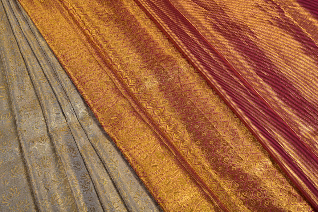 Cream Pure Tissue Silk Saree with Fancy Self Design and Contrast Border