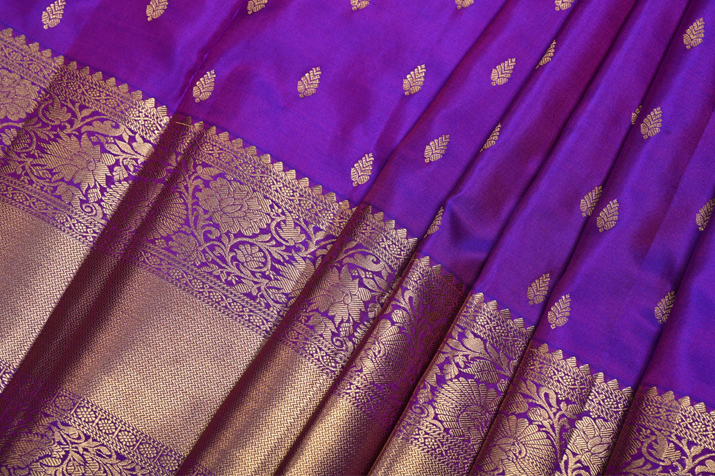 Purple fabric with gold intricate patterns Magenta Pure Kanchi Silk Saree with Golden Butti and Border