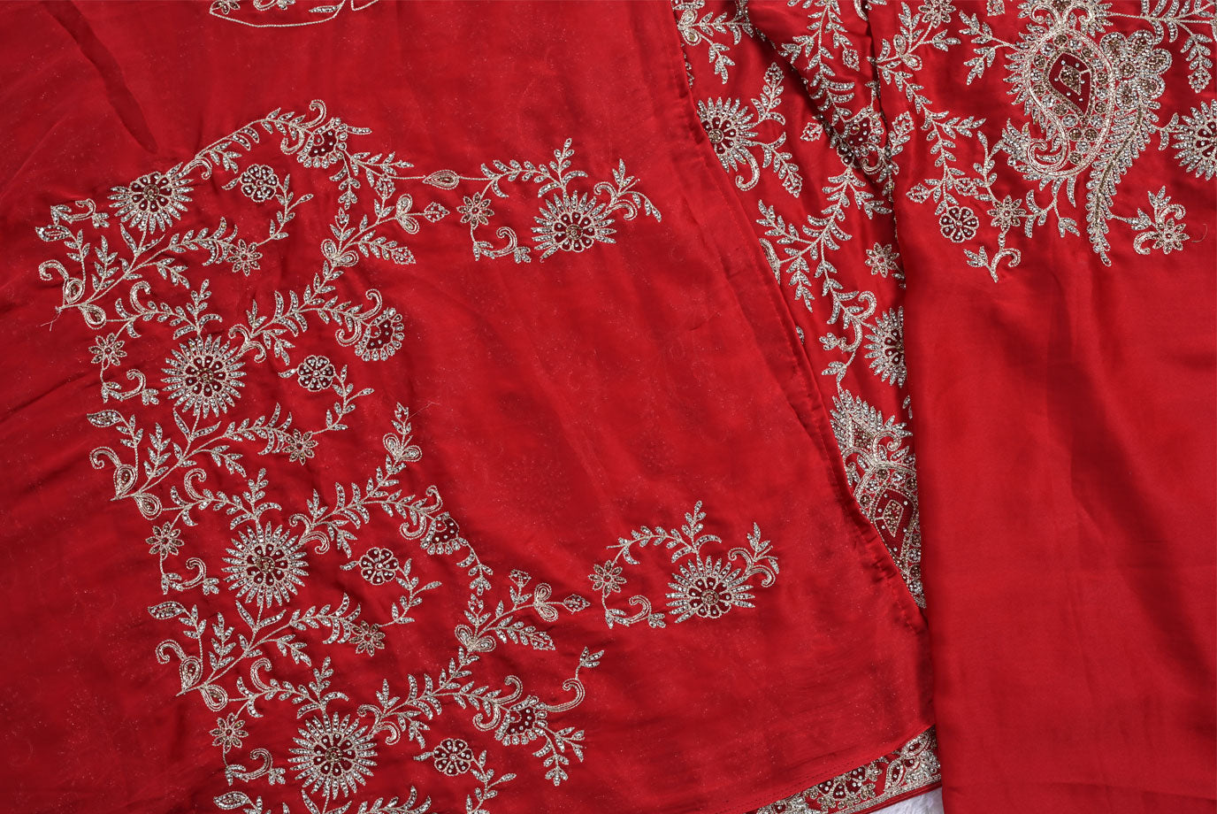 Silk rani colour crape silk saree for weddings and festive occasions
