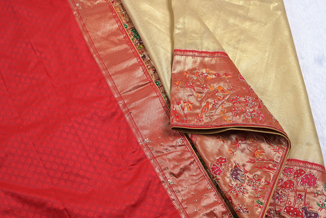Silk rani colour tissue silk saree for weddings and festive occasions