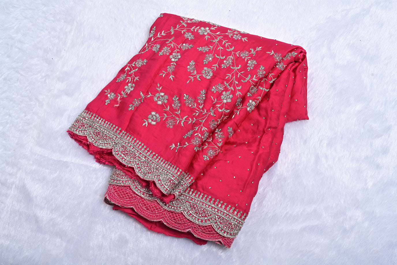 Silk rani colour crape silk saree for weddings and festive occasions