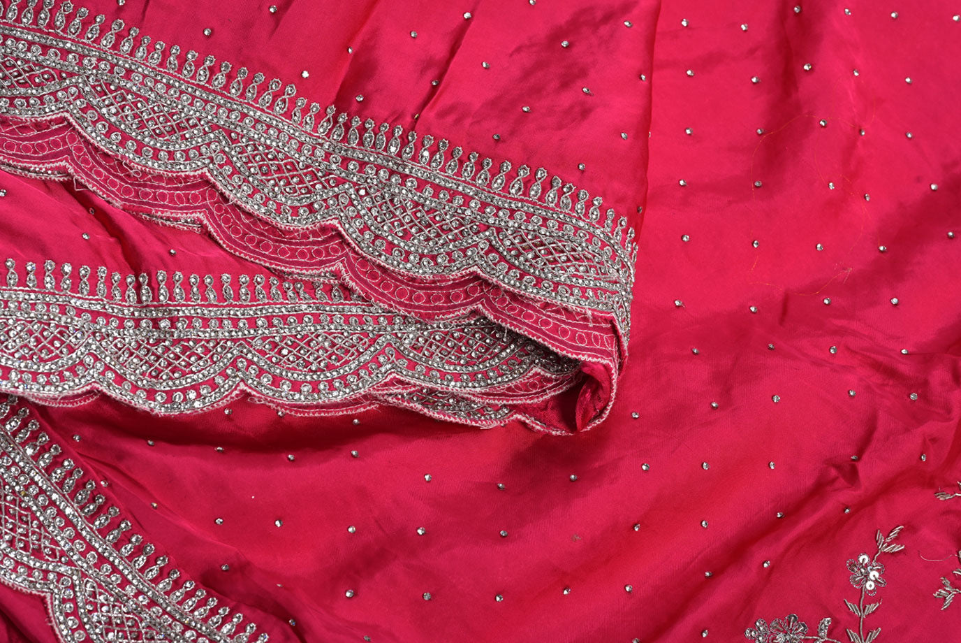 Silk rani colour crape silk saree for weddings and festive occasions