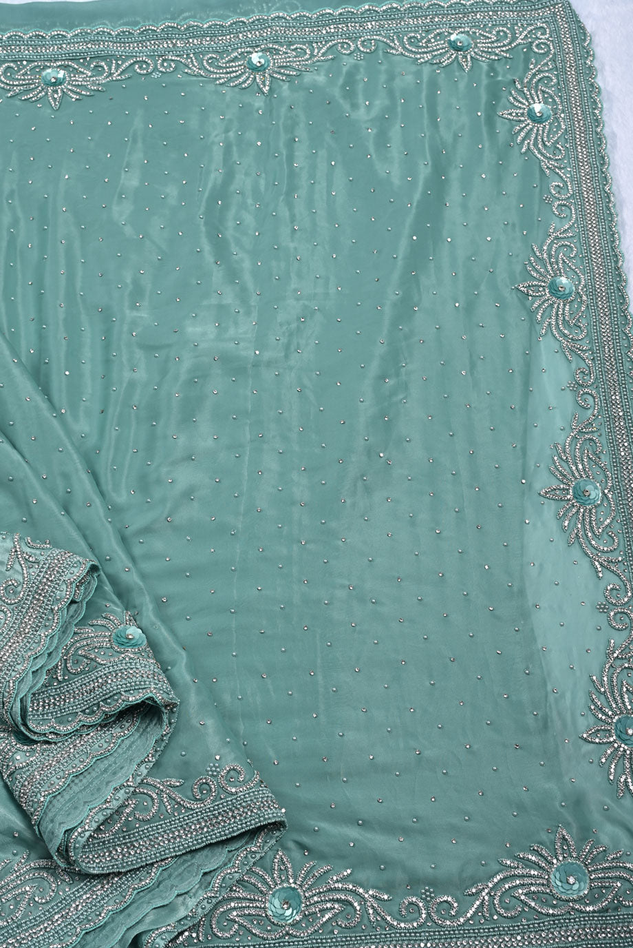 Silk pista green satin silk saree for weddings and festive occasions