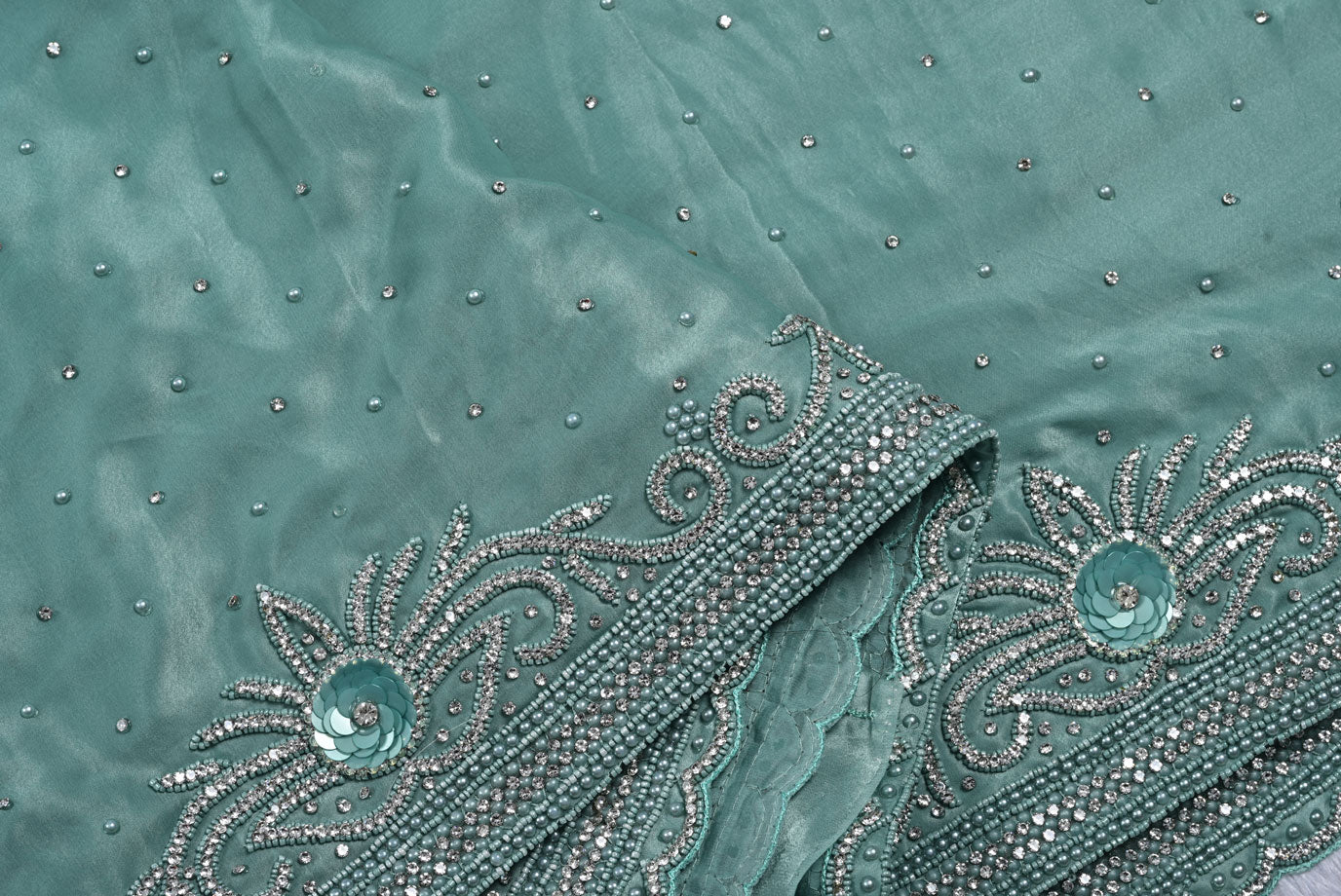 Silk pista green satin silk saree for weddings and festive occasions