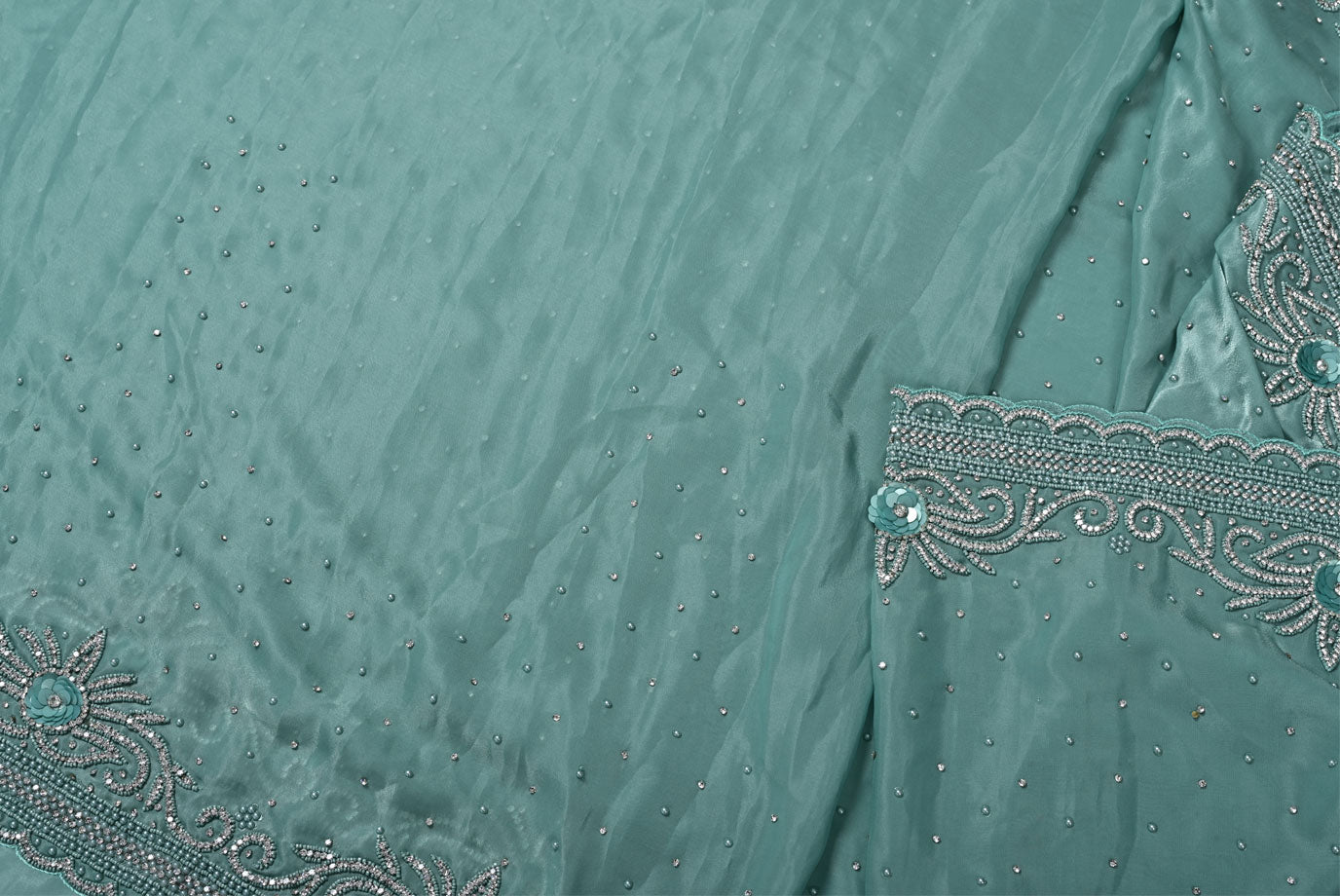 Silk pista green satin silk saree for weddings and festive occasions