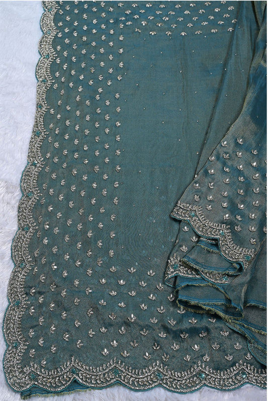 Silk pecock green tissue silk saree for weddings and festive occasions