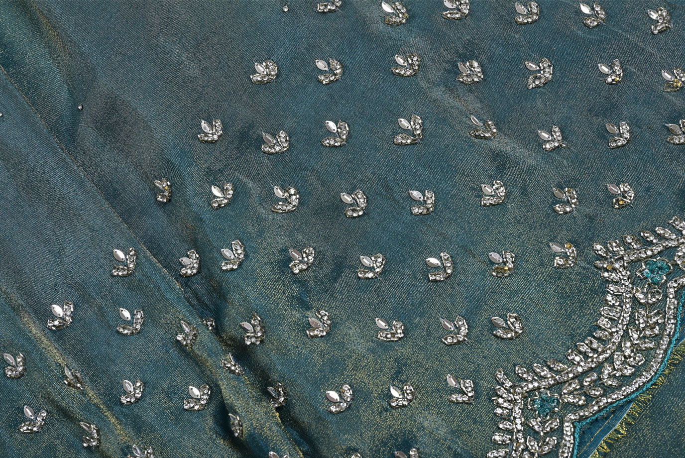 Silk pecock green tissue silk saree for weddings and festive occasions