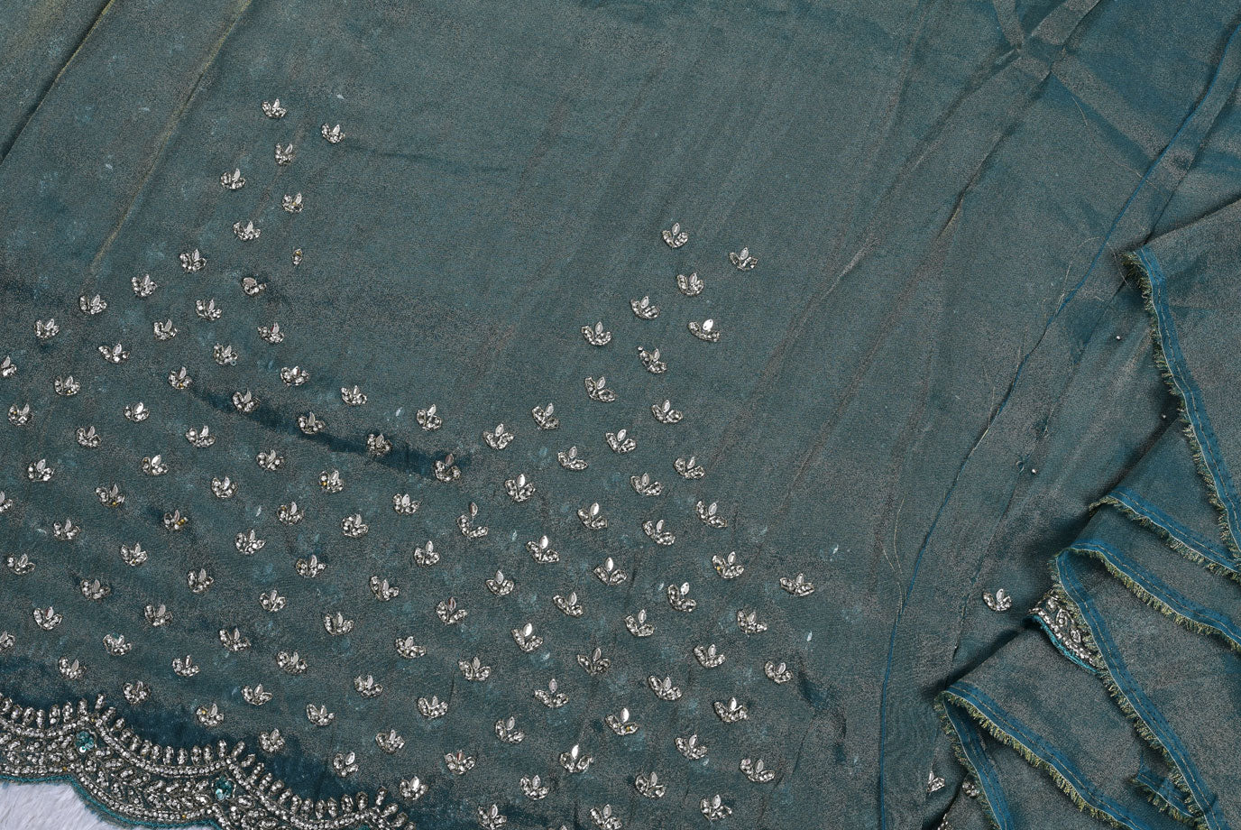 Silk pecock green tissue silk saree for weddings and festive occasions