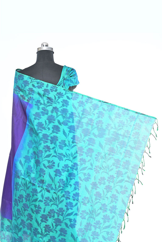 Mannequin wearing a turquoise floral saree with purple border on a white background