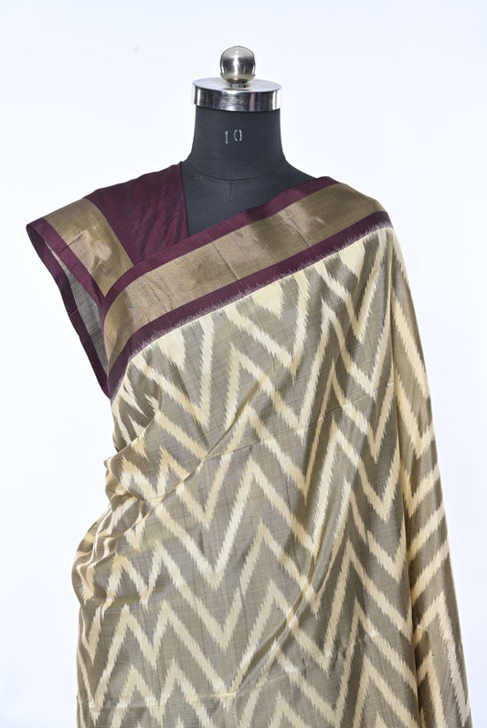 Saree with chevron pattern on a mannequin against a white background