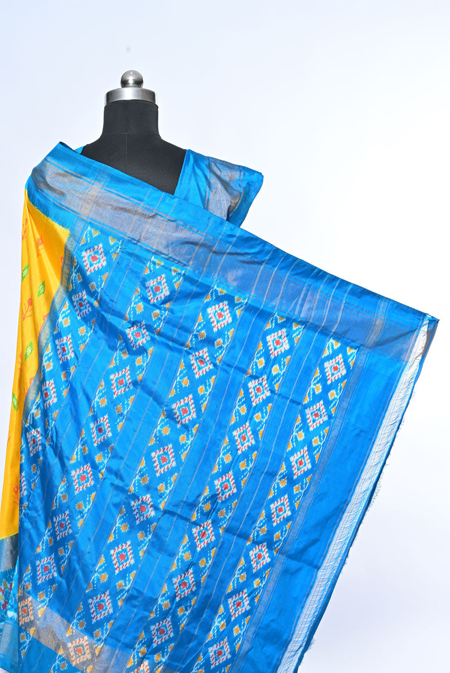 mustered Yellow patola saree for weddings and festive occasions