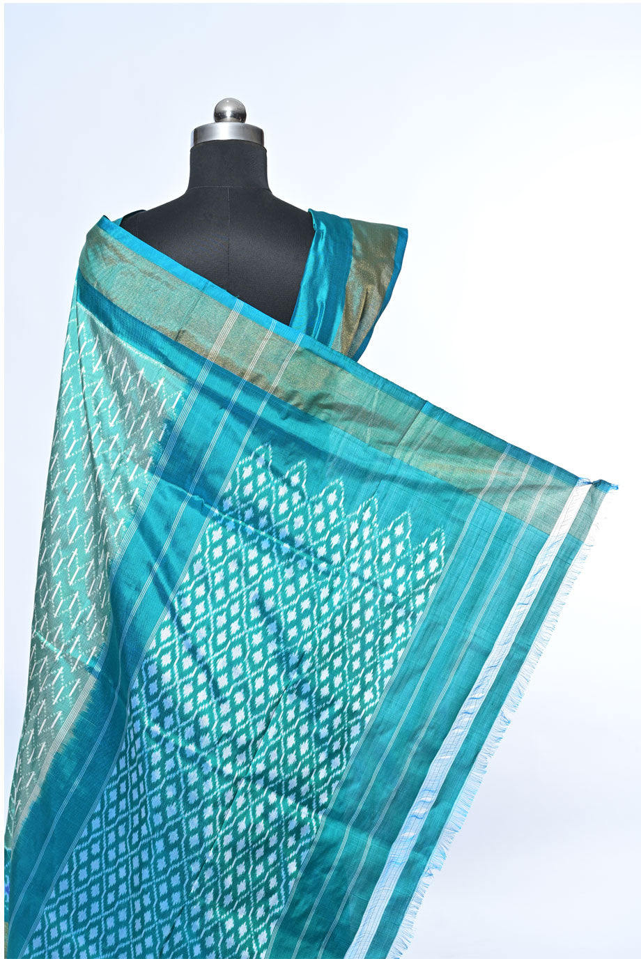 Silk pecock green patola saree for weddings and festive occasions