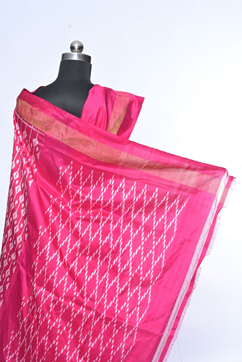 Silk rani pink patola saree for weddings and festive occasions