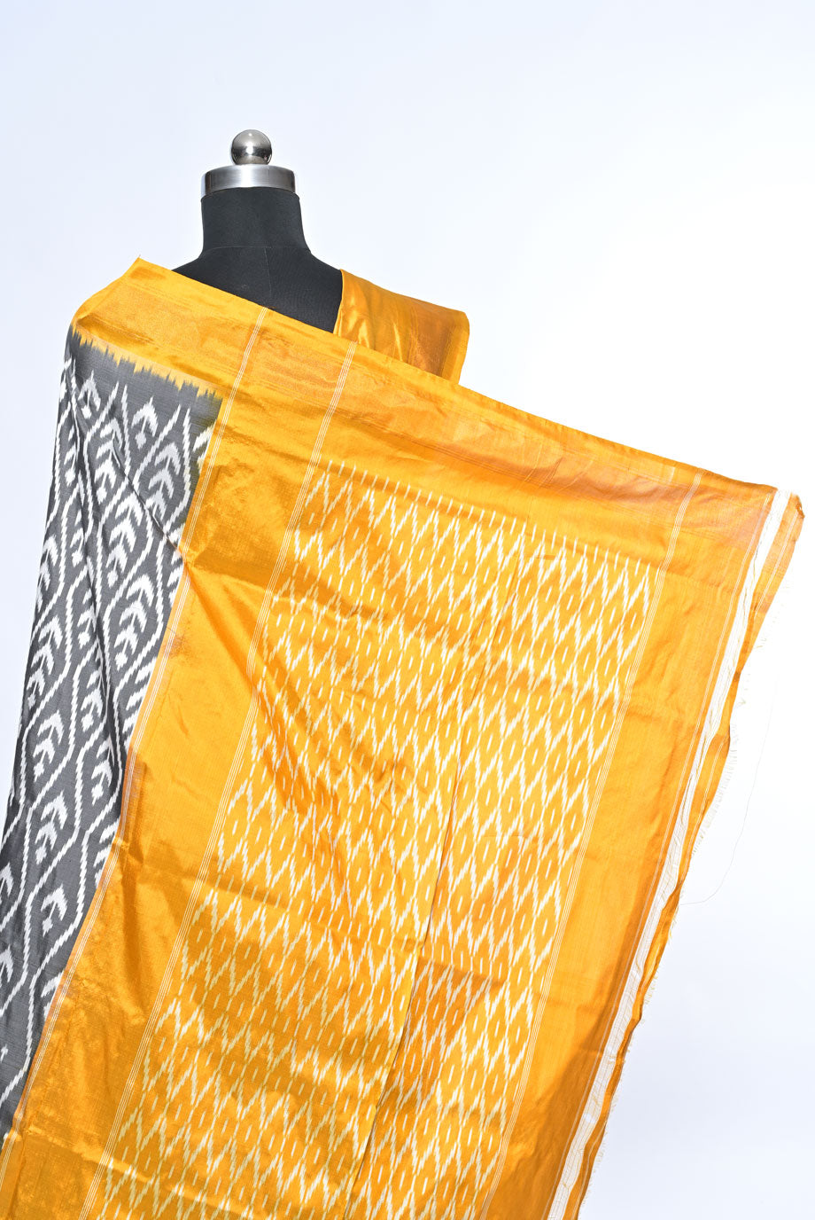 gray patola saree for weddings and festive occasions