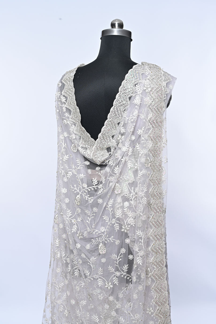 Fabric white net designer saree for weddings and festive occasions