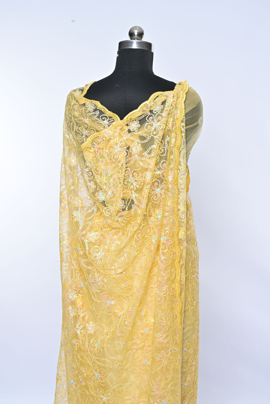 Fabric yellow net designer saree for weddings and festive occasions
