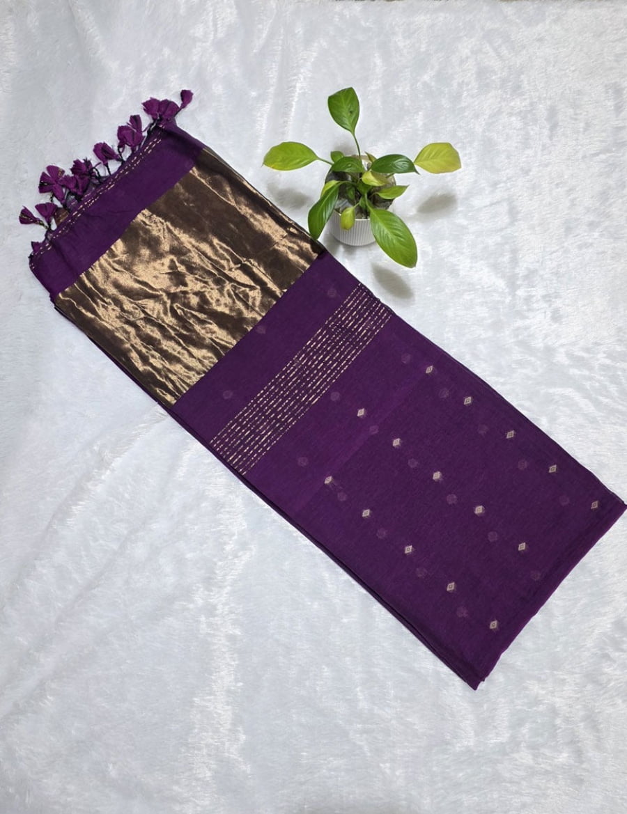 Cotton saree with copper butti work, copper zari pallu, and elegant golden border, ideal for Indian festive and casual wear.