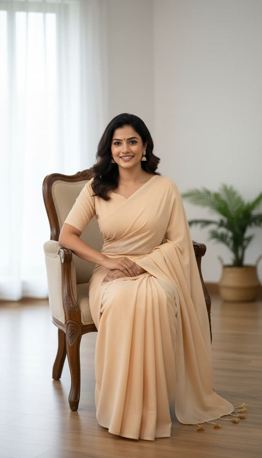 Plain cream mulmul cotton saree with tassel pallu