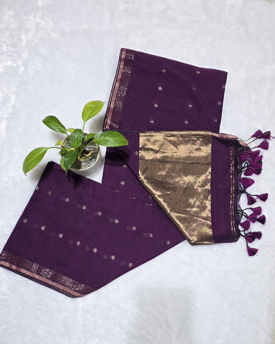 Purple pure cotton saree with all over butties, copper zari pallu and simple golden border with tussels by Kabra the Fashionista