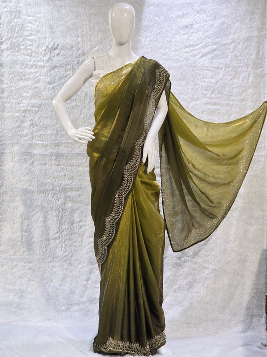 A contemporary neon and bottle green pure satin silk saree featuring a plain body paired with a heavy stone-work necklace border, creating a stunning contrast. The rich border detailing adds a designer edge, while the running blouse maintains a coordinated look. This saree is perfect for pre-wedding functions, mehendi events, and fashionable festive wear.