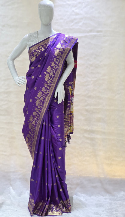 A rich tana silk paithani saree featuring evenly spaced lotus buttis woven in golden zari. The floral lotus border and traditional rich pallu elevate its classic charm. Comes with a self blouse for a graceful traditional look.