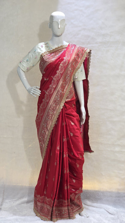 Radiant red Banarasi saree with silver zari motifs that add timeless ethnic beauty. A perfect pick for bridal trousseau and festive nights.