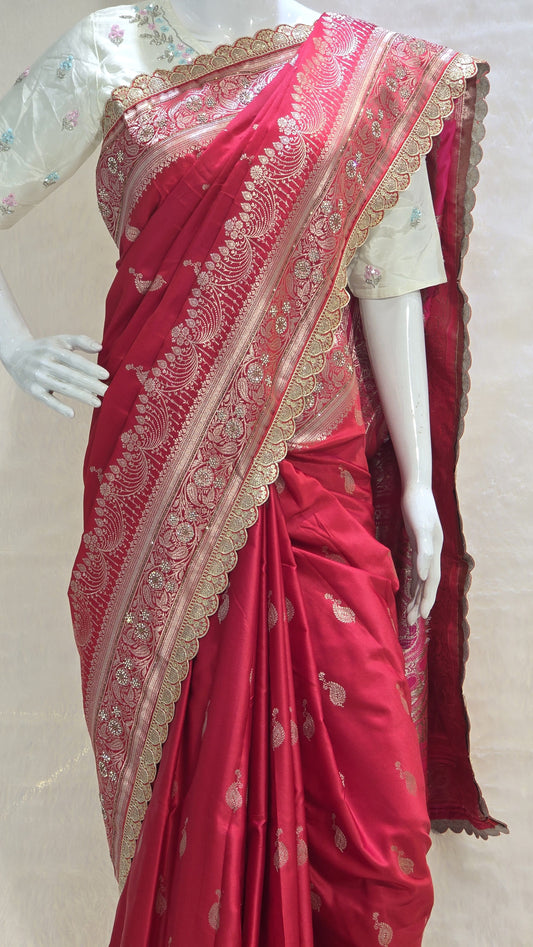 Radiant red Banarasi saree with silver zari motifs that add timeless ethnic beauty. A perfect pick for bridal trousseau and festive nights.
