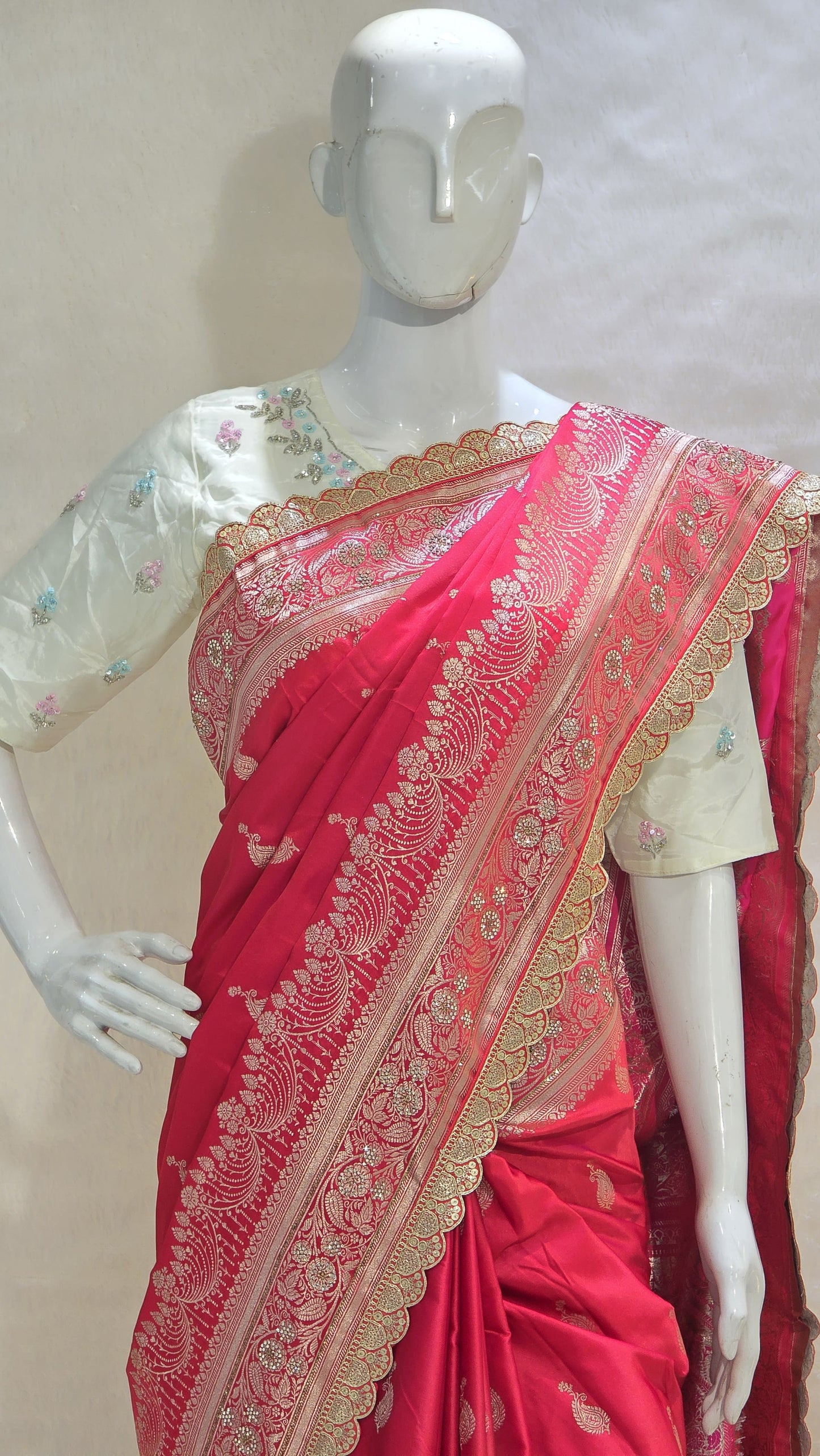 Radiant red Banarasi saree with silver zari motifs that add timeless ethnic beauty. A perfect pick for bridal trousseau and festive nights.