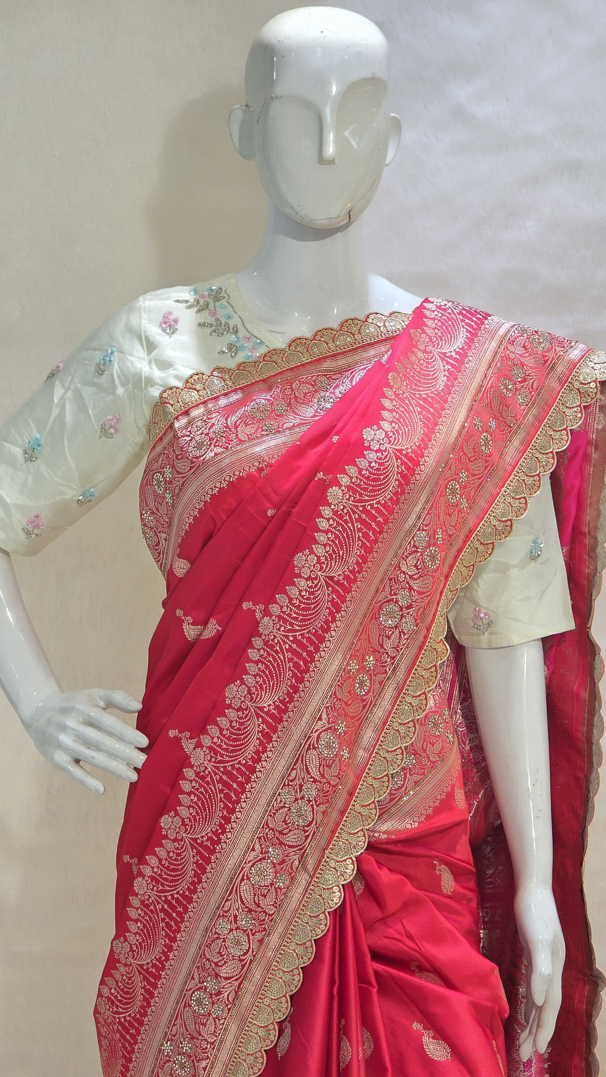 Radiant red Banarasi saree with silver zari motifs that add timeless ethnic beauty. A perfect pick for bridal trousseau and festive nights.