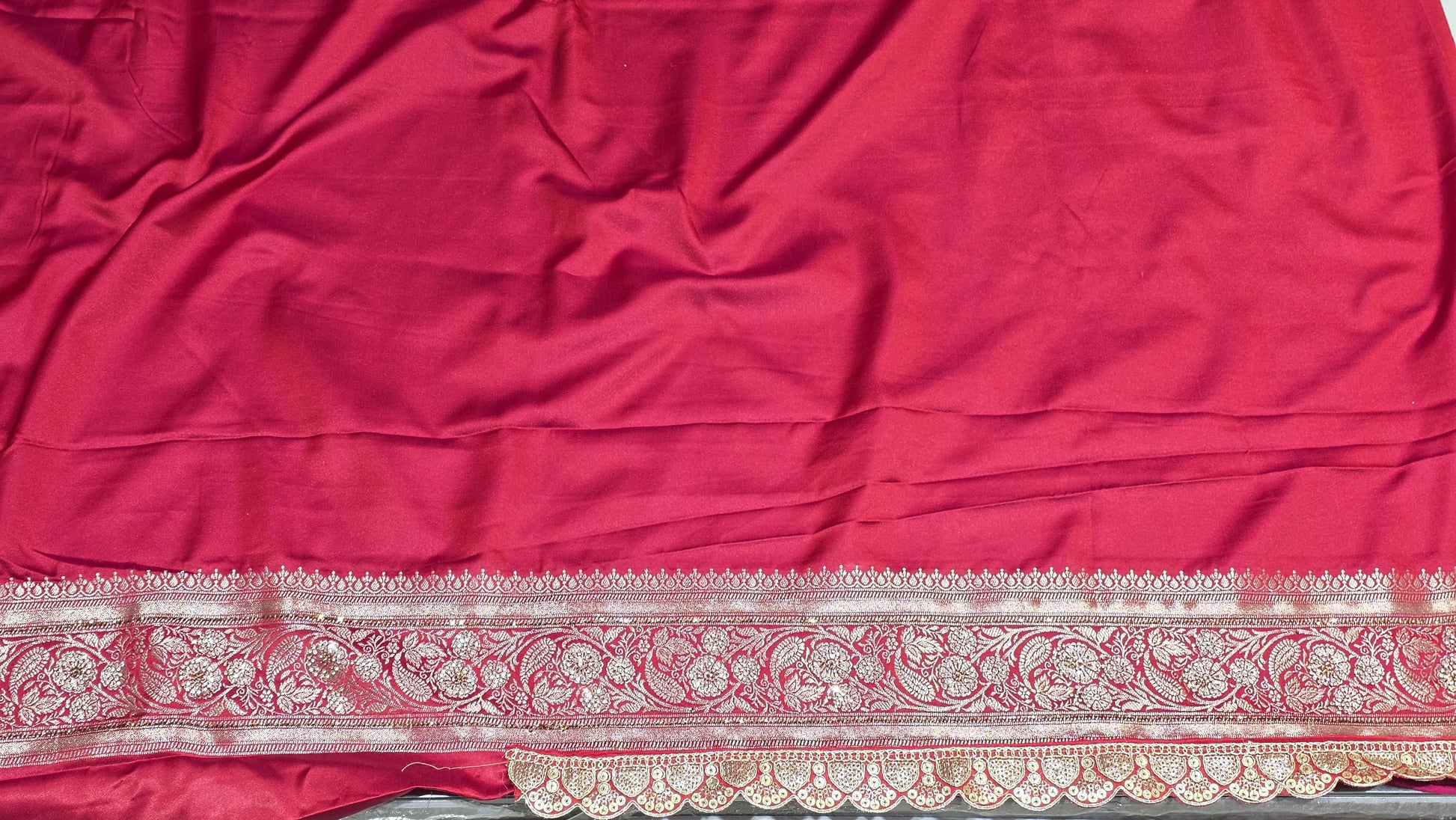 Radiant red Banarasi saree with silver zari motifs that add timeless ethnic beauty. A perfect pick for bridal trousseau and festive nights.