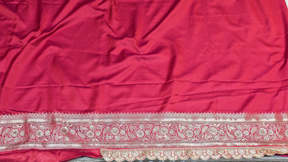 Radiant red Banarasi saree with silver zari motifs that add timeless ethnic beauty. A perfect pick for bridal trousseau and festive nights.