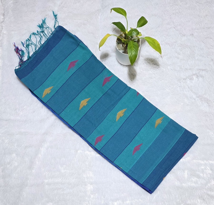 Traditional blue pure cotton saree with triangle butties, Ikat border pattern and tassel pallu