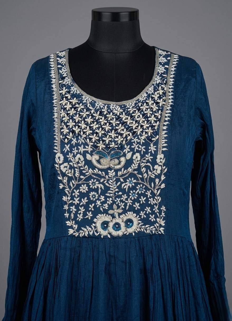 Sophisticated navy blue georgette Anarkali dress with empire waist and delicate sequin embroidery on the yoke