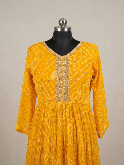 Festive yellow Anarkali dress with embroidery and flowy silhouette