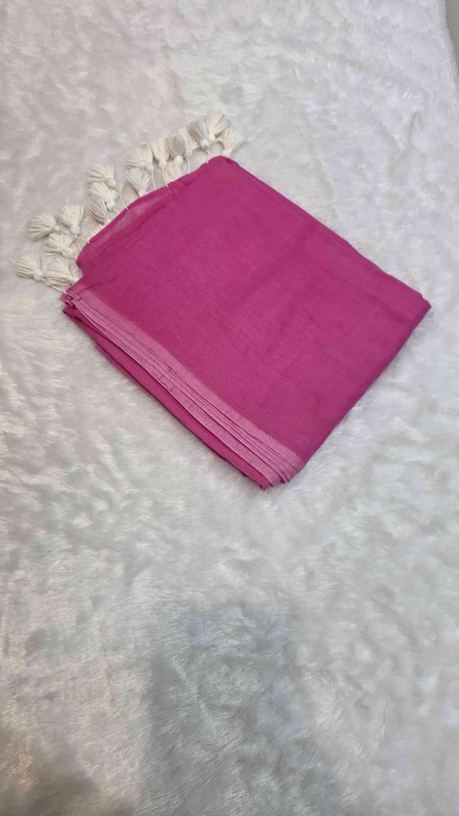 Elegant pink plain cotton saree with tassel details