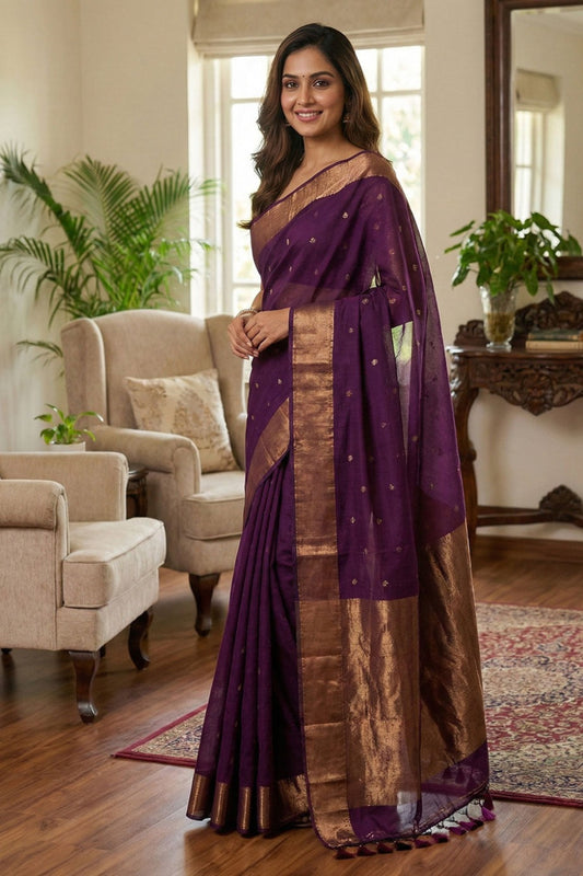 Purple pure cotton saree with all over butties, copper zari pallu and simple golden border with tussels by Kabra the Fashionista