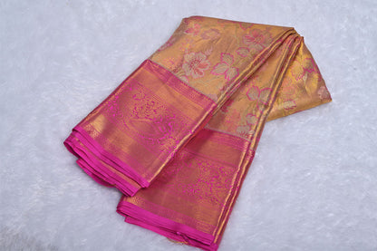 Golden Pure Tissue Silk Kanjivaram Saree with Floral Zari Work and Contrast Border