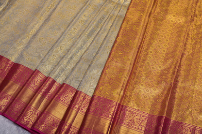 Cream Pure Tissue Silk Saree with Fancy Self Design and Contrast Border