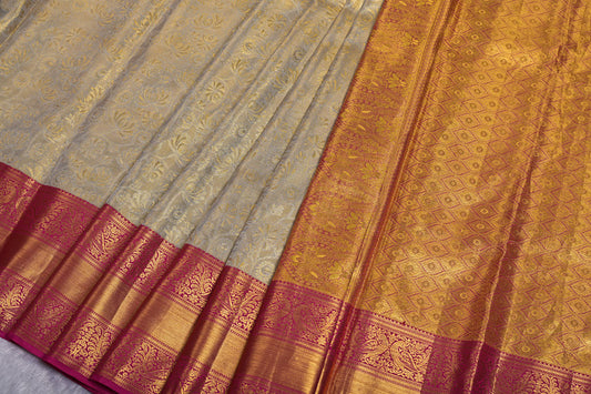 Cream Pure Tissue Silk Saree with Fancy Self Design and Contrast Border
