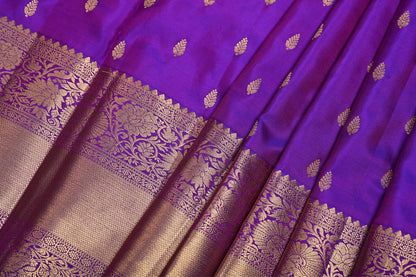Purple fabric with gold intricate patterns Magenta Pure Kanchi Silk Saree with Golden Butti and Border
