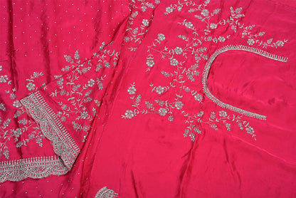 Silk rani colour crape silk saree for weddings and festive occasions