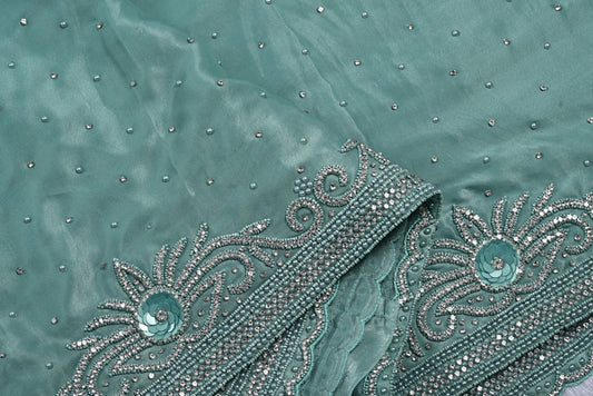 Silk pista green satin silk saree for weddings and festive occasions