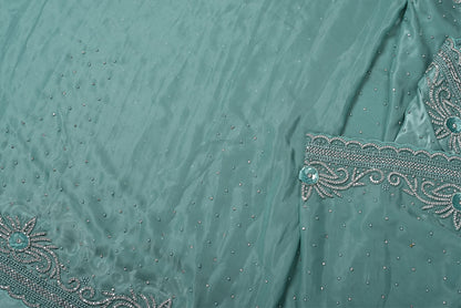Silk pista green satin silk saree for weddings and festive occasions