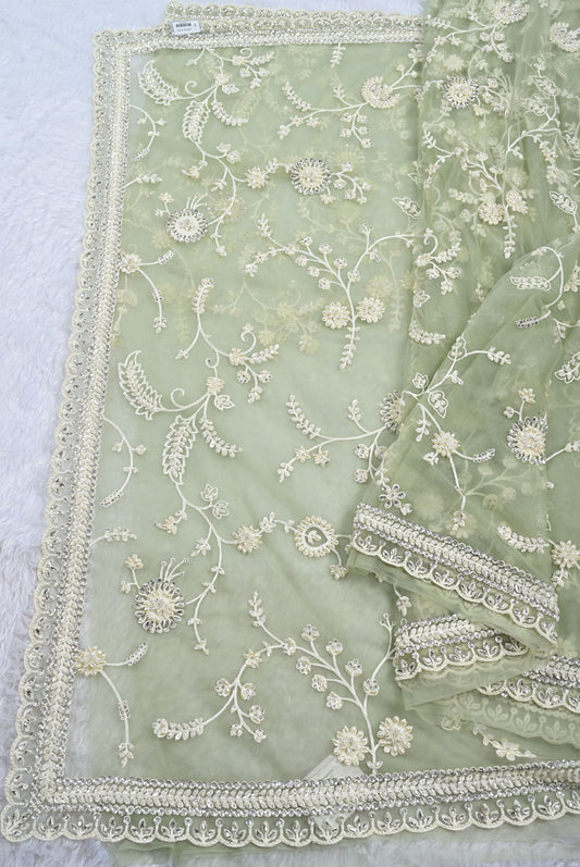 Fabric pista green net designer saree for weddings and festive occasions