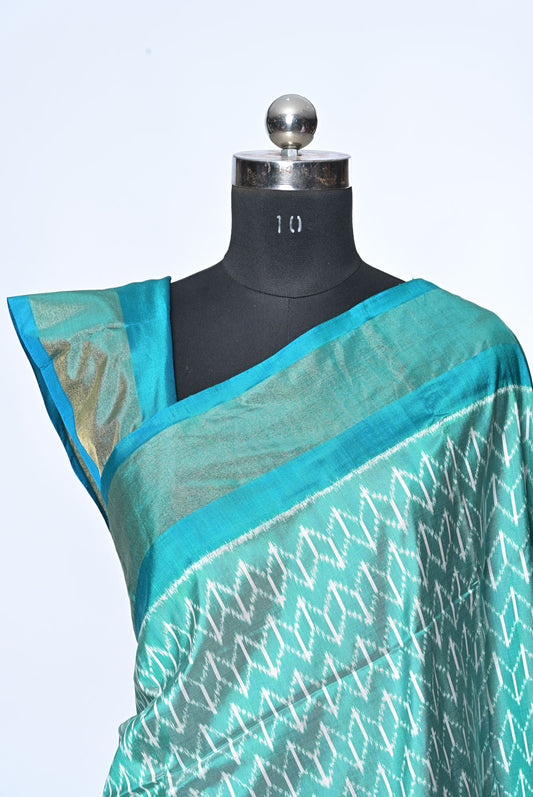 Silk pecock green patola saree for weddings and festive occasions