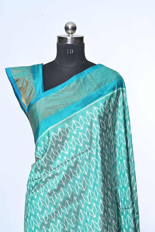 Silk pecock green patola saree for weddings and festive occasions