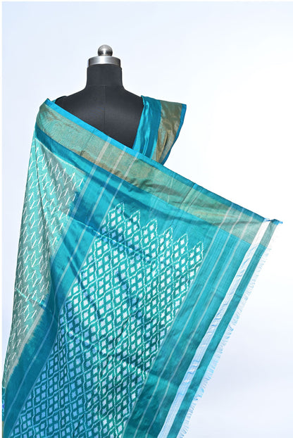 Silk pecock green patola saree for weddings and festive occasions